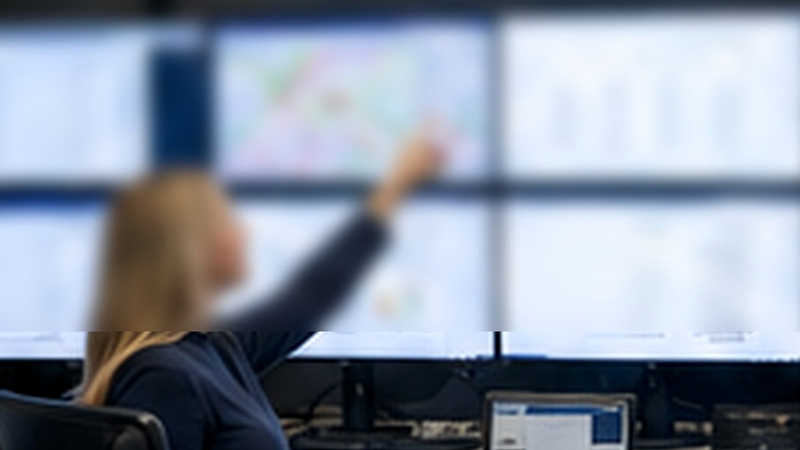 Parking operations analyst reviewing records and reports